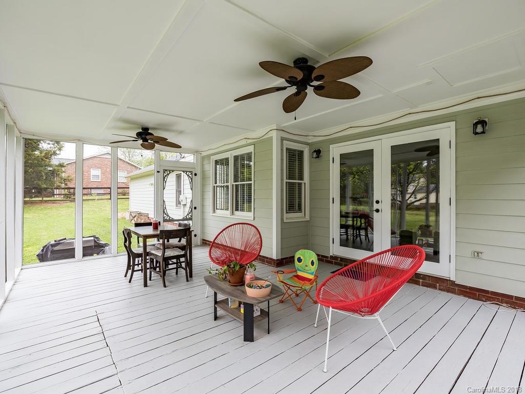 1527 Cobblestone Court, Unit 27A Fort Mill, SC 29708 - Photo 26 of 30 a view of a dining room with wooden floor and city view