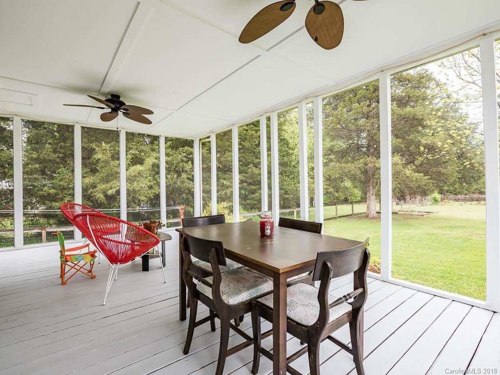 1527 Cobblestone Court, Unit 27A Fort Mill, SC 29708 - Photo 27 of 30 a dining room with furniture and window