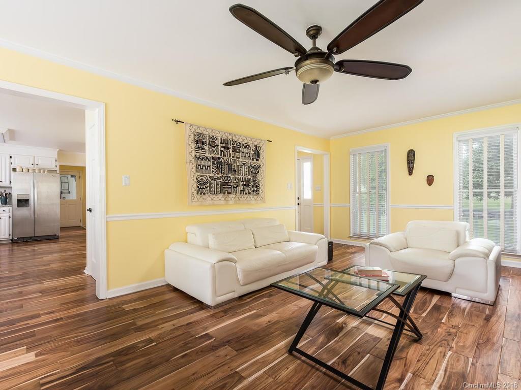 1527 Cobblestone Court, Unit 27A Fort Mill, SC 29708 - Photo 8 of 30 a living room with furniture and a large window