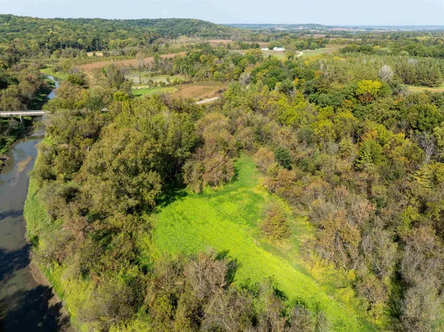 a view of an ocean and mountain