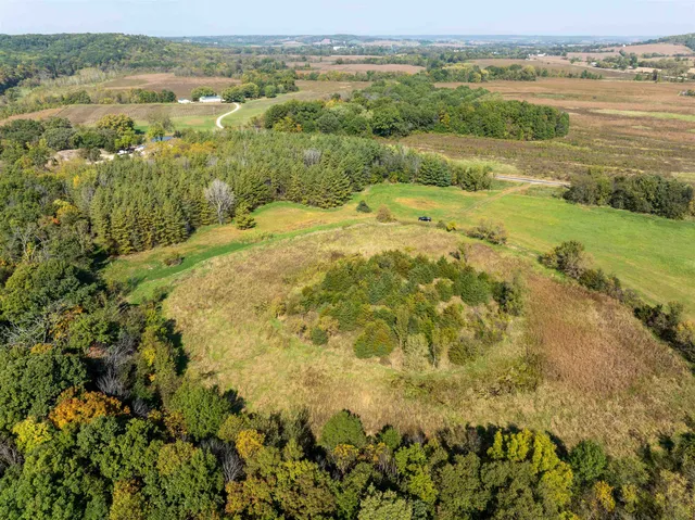 an aerial view of residential house and outdoor space
