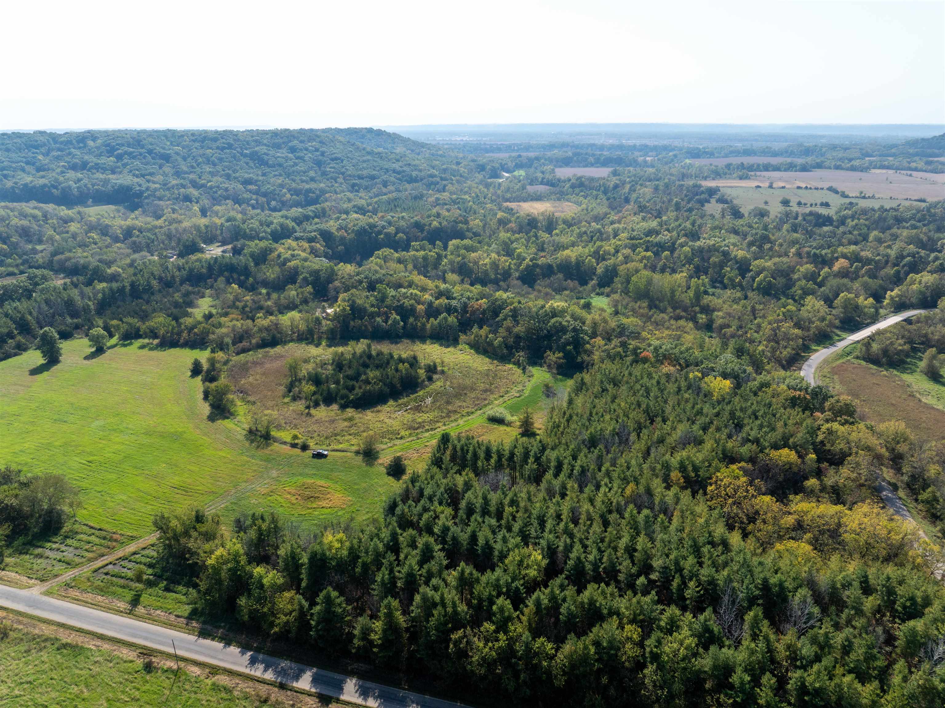 0 South Crazy Hollow Road Hanover, IL 61041 - Photo 22 of 98 an aerial view of residential houses with outdoor space and trees