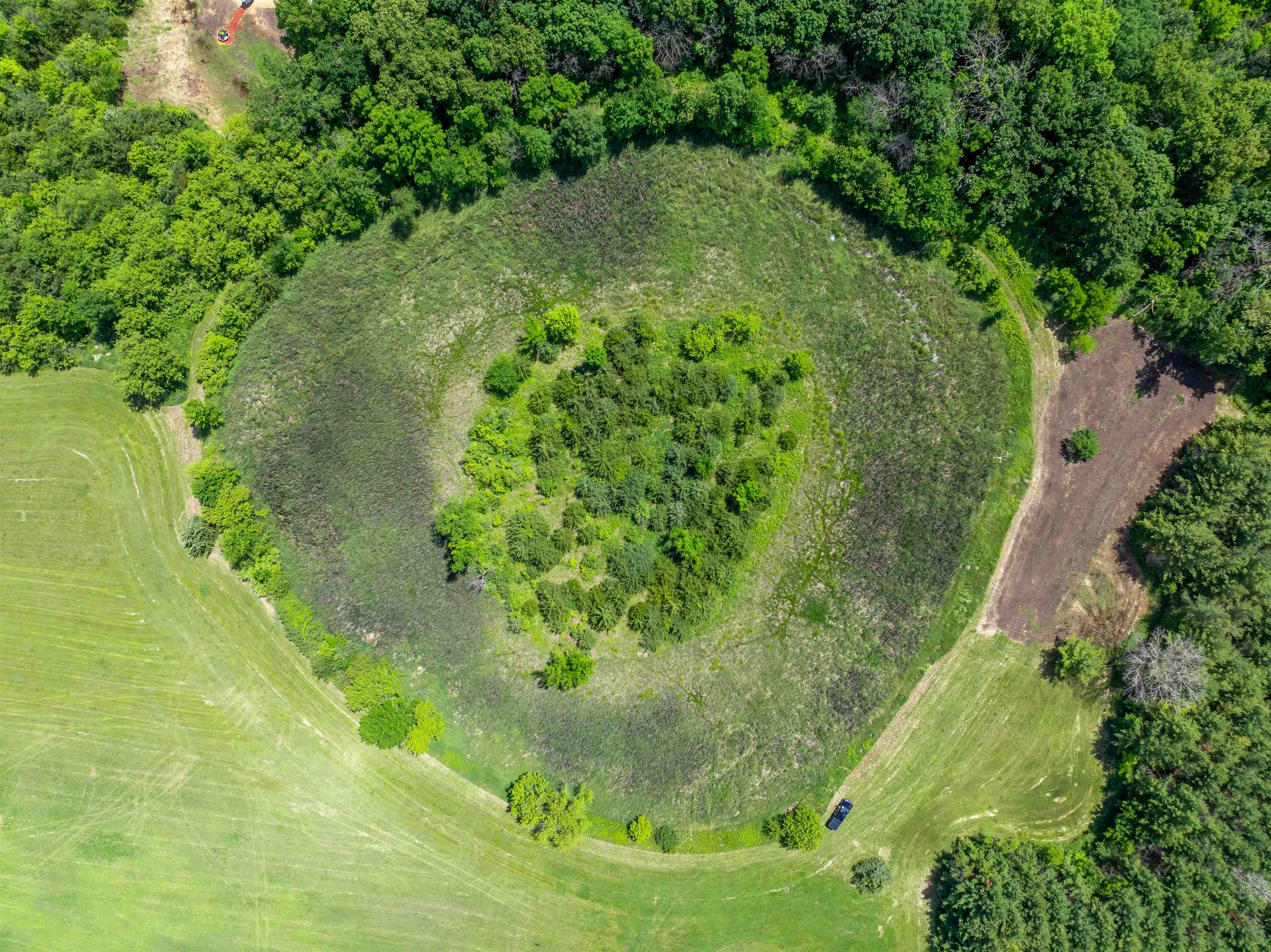 0 South Crazy Hollow Road Hanover, IL 61041 - Photo 45 of 98 a view of a garden with a fountain