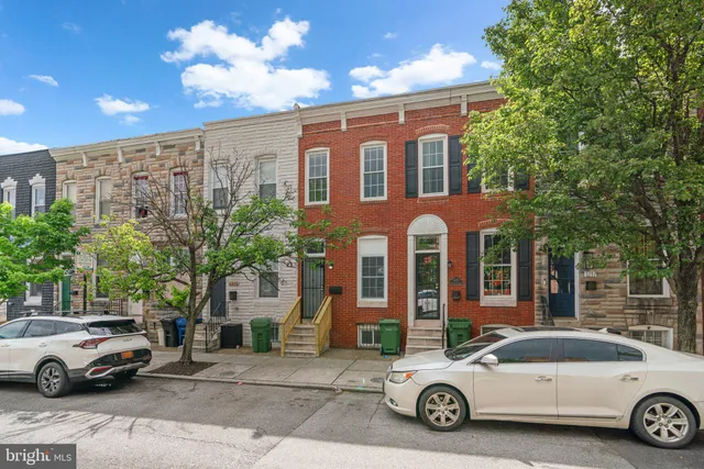 a car parked in front of a building