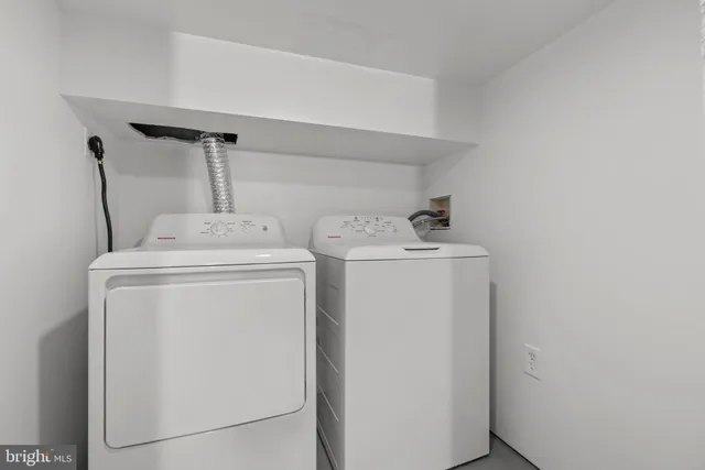 a front view of a house with a deck