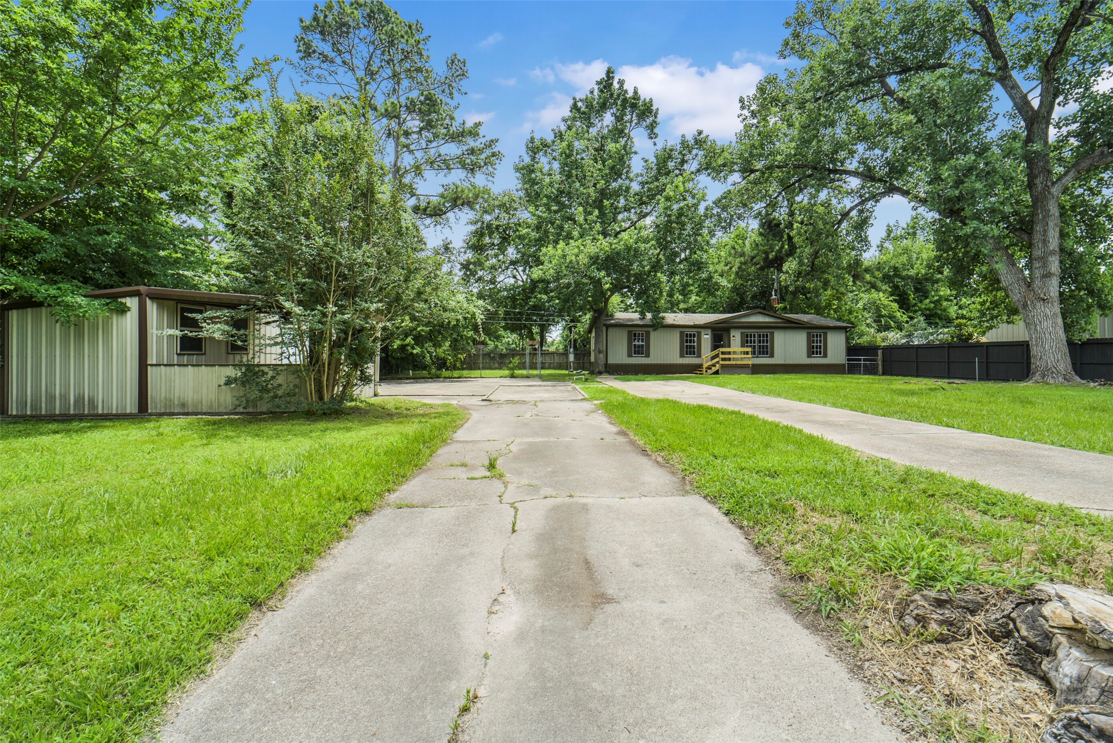 11023 Forrest Valley Drive Houston, TX 77065 - Photo 37 of 47 a view of a house with a yard