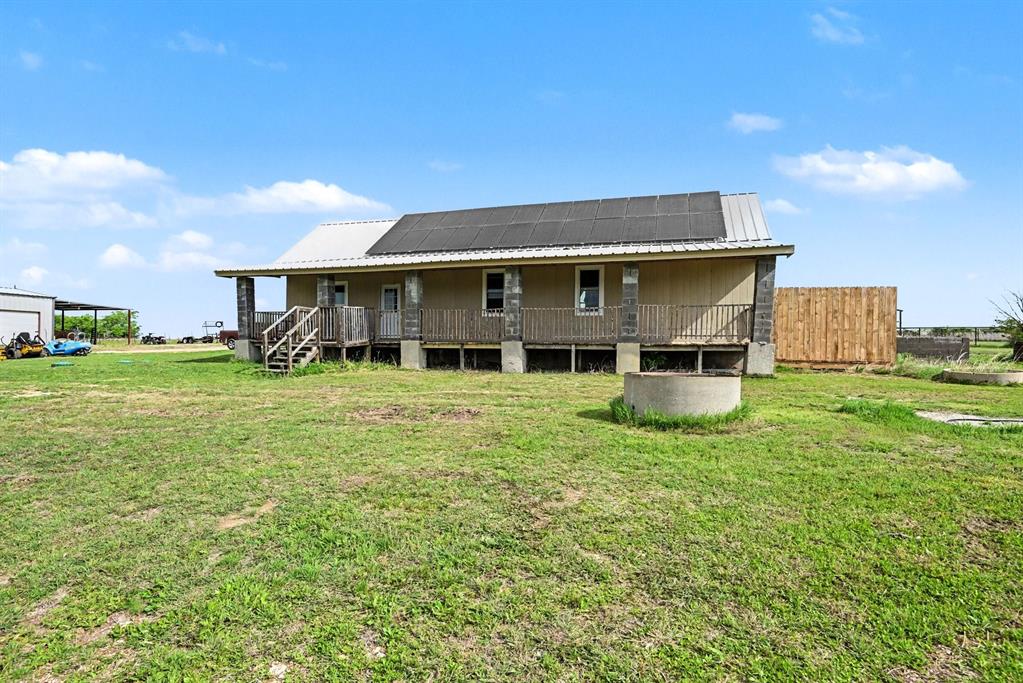 6694 Hutcheson Hill Road Springtown, TX 76082 - Photo 24 of 37 a view of a house with backyard