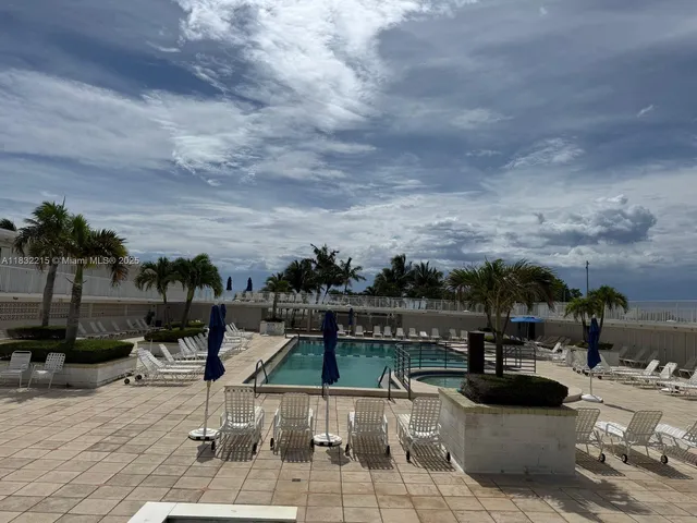 a view of a terrace with sitting area