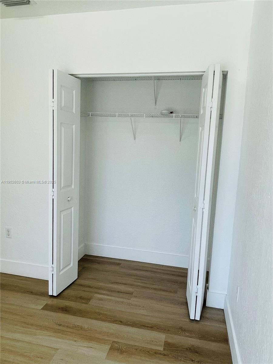 1370 West 30th Street, Unit 1370 Hialeah, FL 33012 - Photo 16 of 23 a view of wooden floor