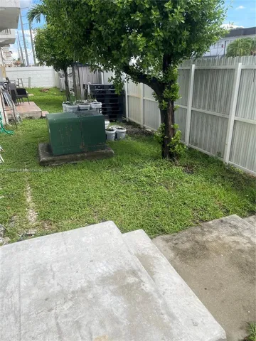 a view of a backyard with a garden