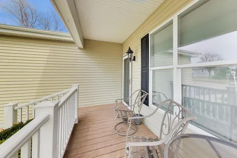 a view of balcony with seating space