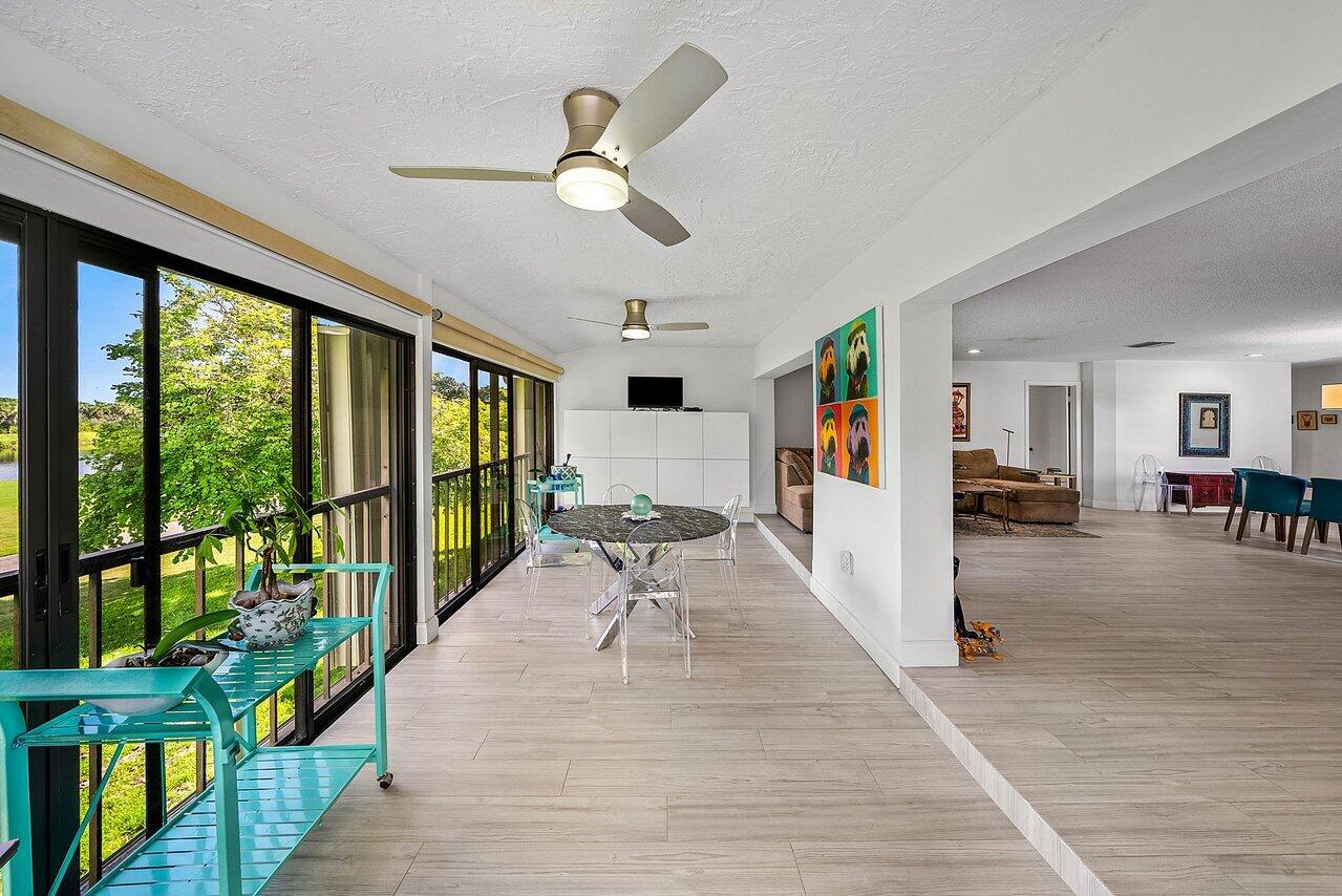 7920 Eastlake Drive, Unit 19B Boca Raton, FL 33433 - Photo 20 of 40 a view of interior space with wooden floor and windows