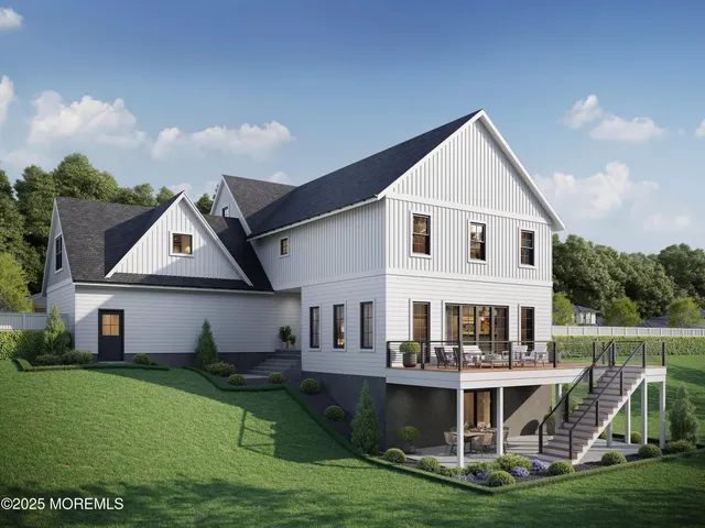 a aerial view of a house with a yard and potted plants