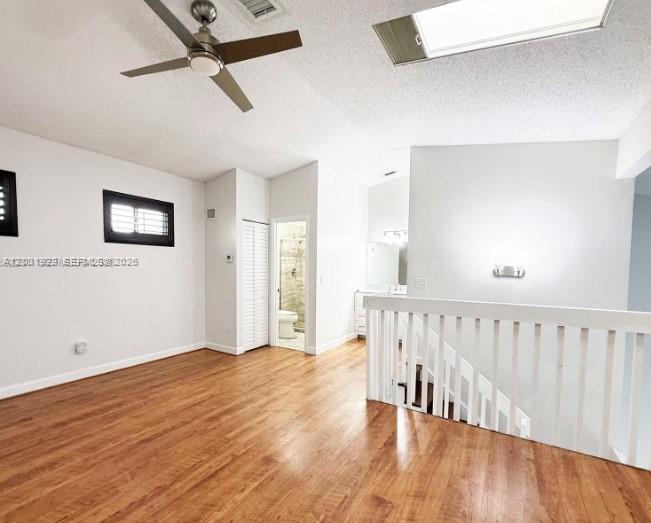 4182 South Pine Island Road Davie, FL 33328 - Photo 3 of 6 a view of an empty room with wooden floor