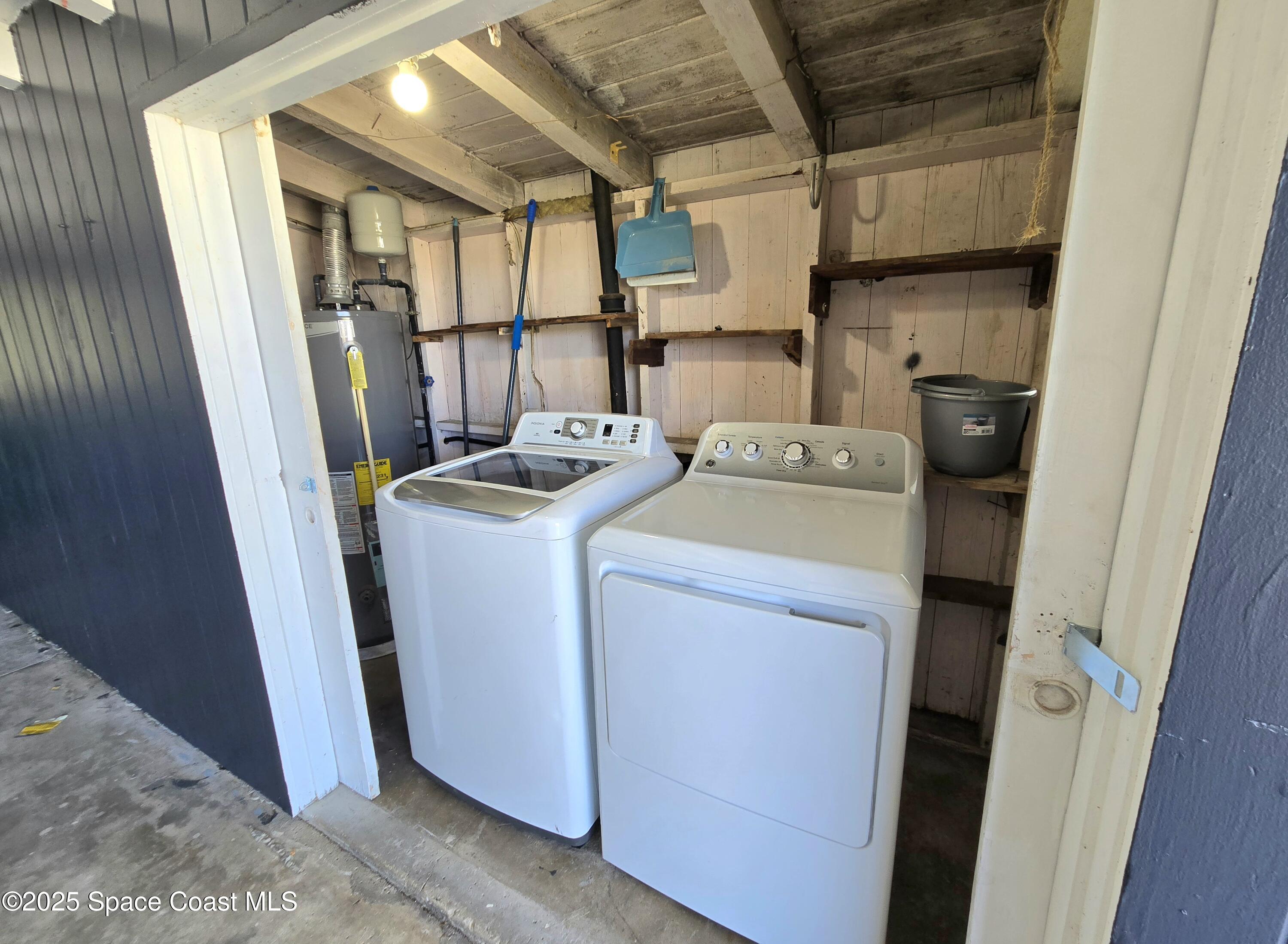 2373 Allan Adale Road Melbourne, FL 32935 - Photo 16 of 19 a utility room with dryer and washer