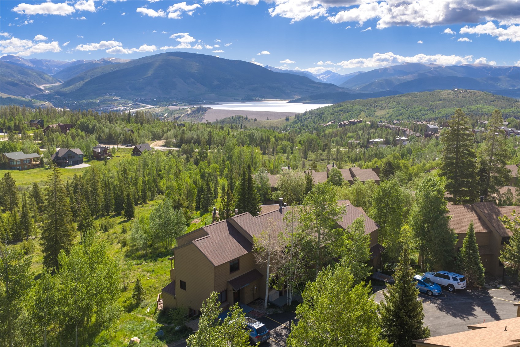 6726 Ryan Gulch Road, Unit 6726 Wildernest, CO 80498 - Photo 38 of 39 a view of a city with mountains in the background