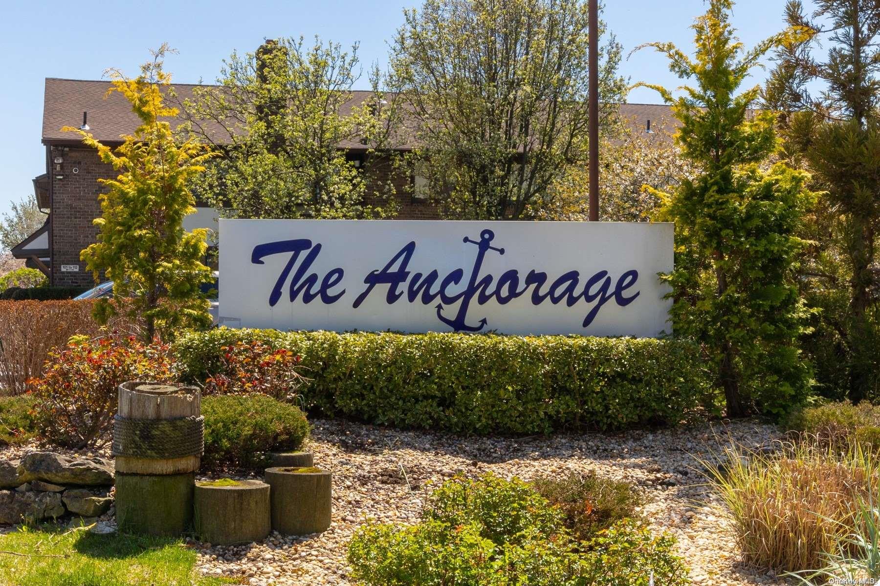 a view of outdoor space with signage and flags