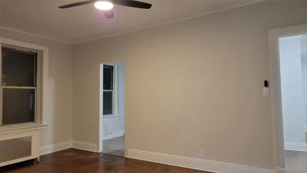 a picture of a park with furniture and a window