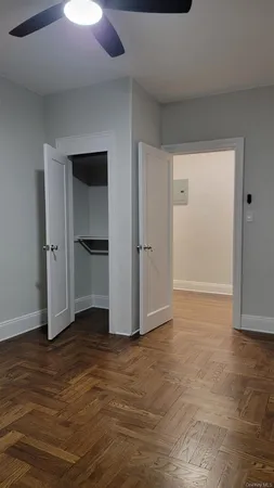 a view of a livingroom with wooden floor