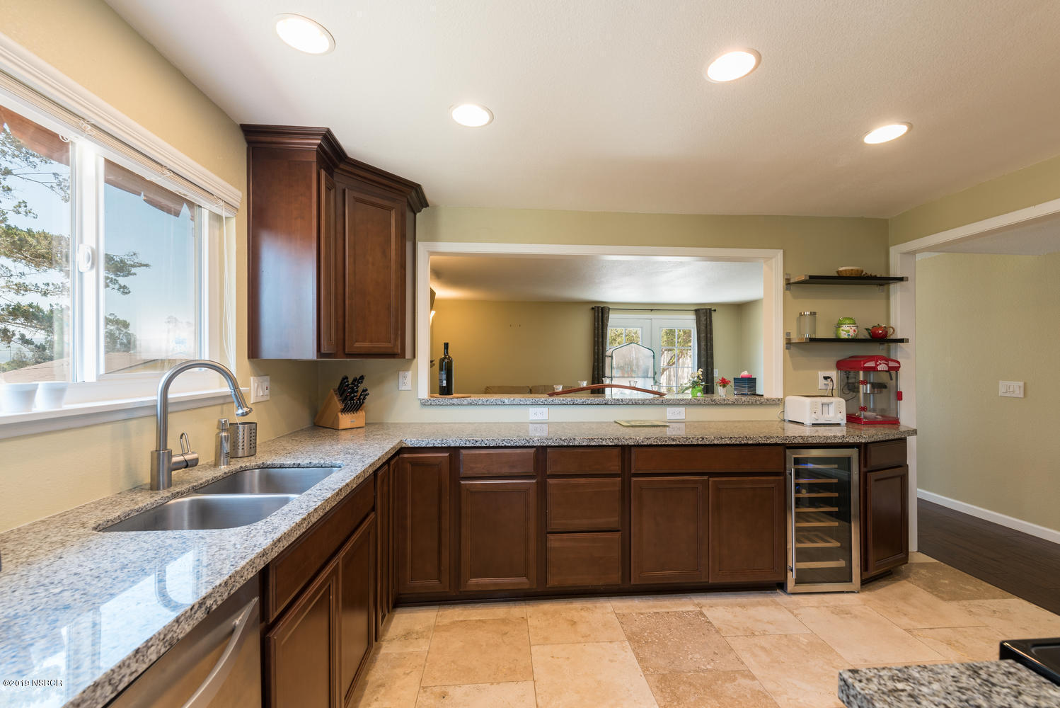 1386 Onstott Road Lompoc, CA 93436 - Photo 11 of 35 a kitchen with a sink stove and cabinets