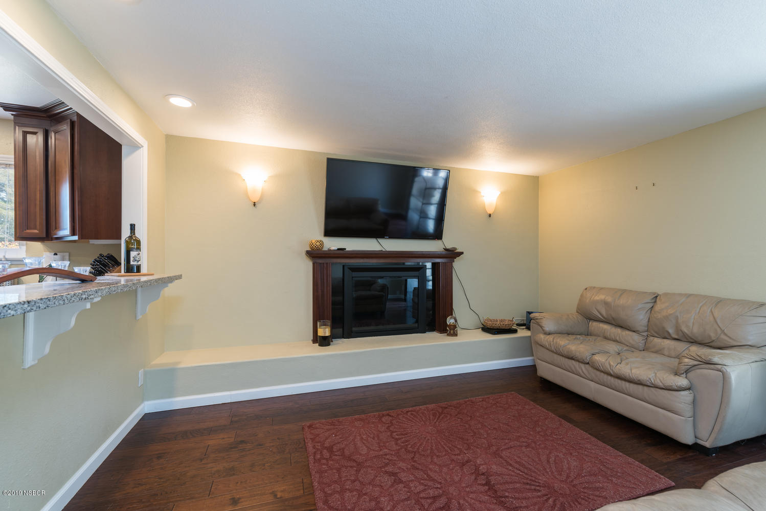 1386 Onstott Road Lompoc, CA 93436 - Photo 13 of 35 a living room with furniture and a flat screen tv