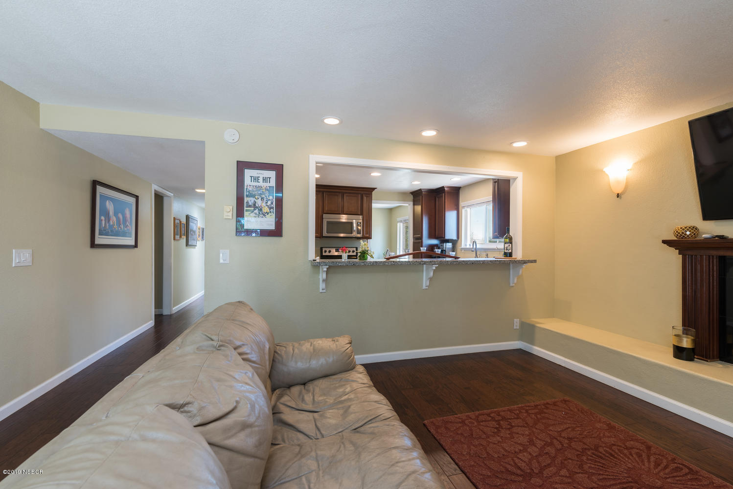 1386 Onstott Road Lompoc, CA 93436 - Photo 14 of 35 a living room with a couch and a flat screen tv
