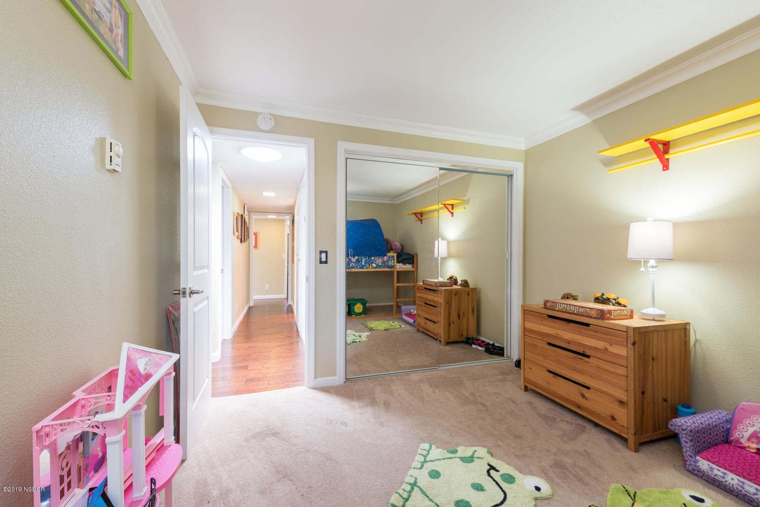 1386 Onstott Road Lompoc, CA 93436 - Photo 23 of 35 a view of a bedroom with a bed and toys