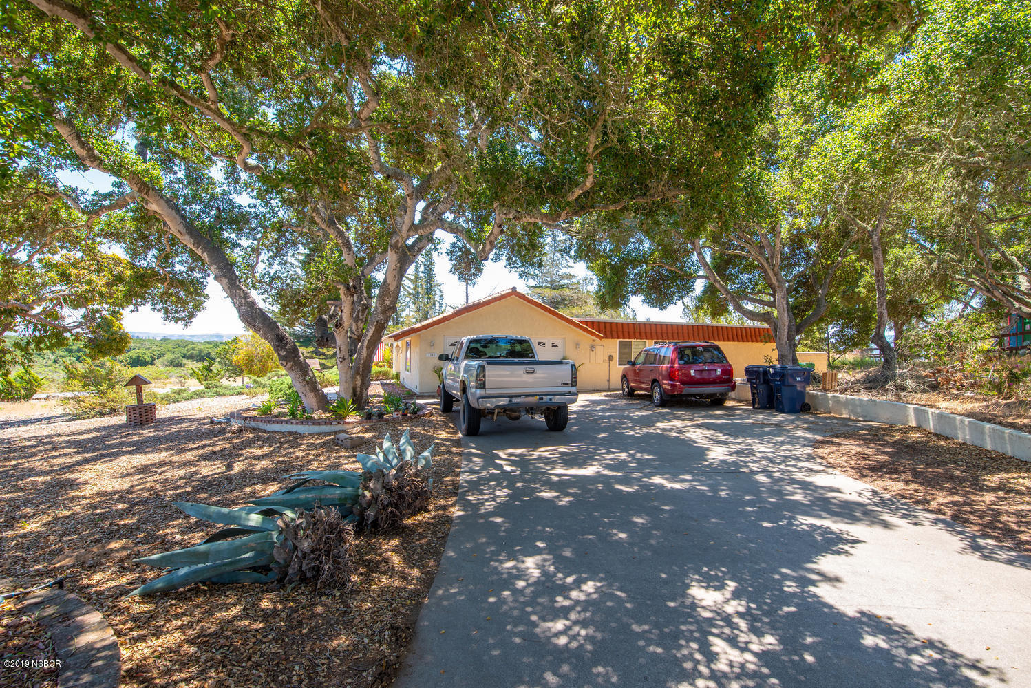 1386 Onstott Road Lompoc, CA 93436 - Photo 35 of 35 a car parked in front of a house