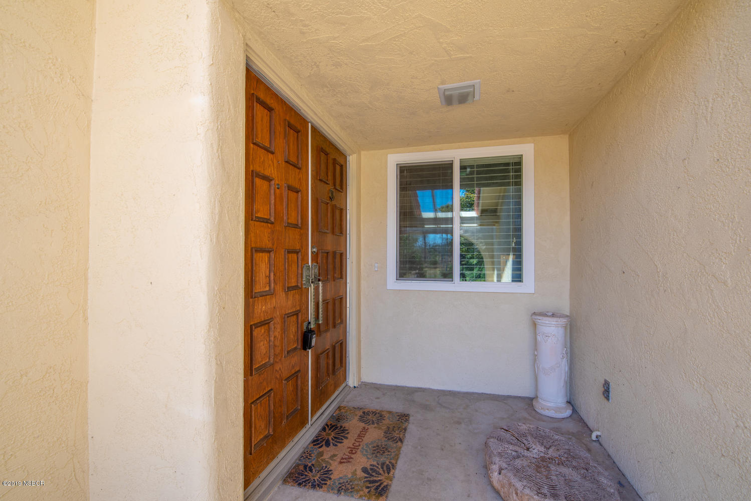 1386 Onstott Road Lompoc, CA 93436 - Photo 4 of 35 a view of an empty room with windows