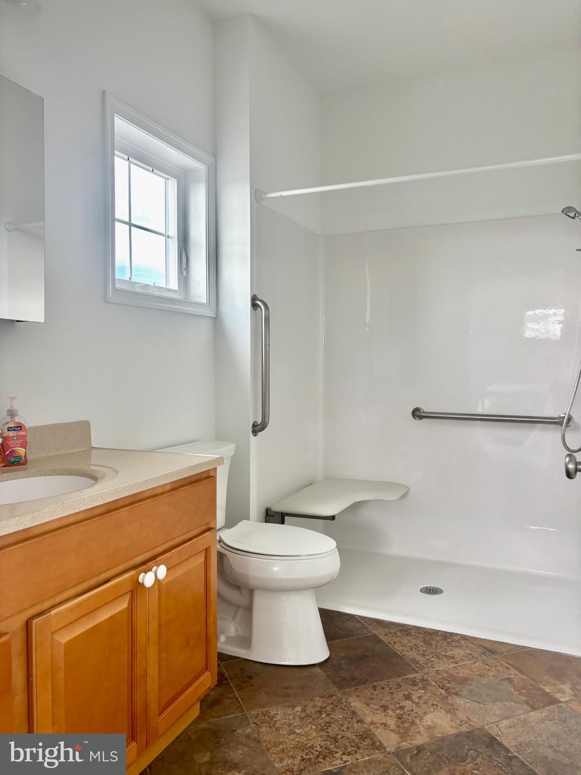 448 Dock Road West Creek, NJ 08092 - Photo 15 of 36 a bathroom with a sink a toilet and a shower