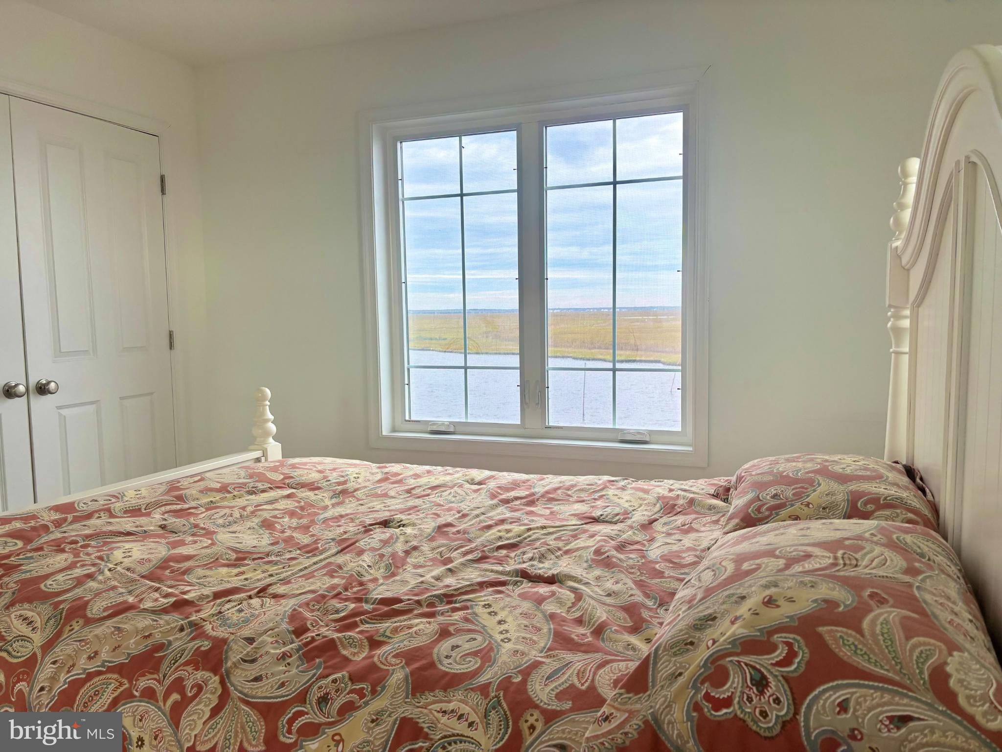 448 Dock Road West Creek, NJ 08092 - Photo 21 of 36 a bedroom with a bed and a window