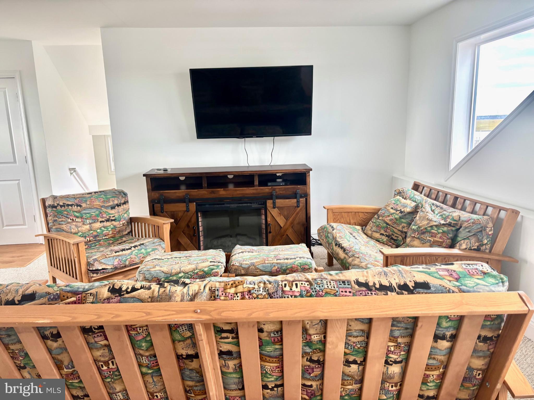 448 Dock Road West Creek, NJ 08092 - Photo 27 of 36 a bedroom with a bed and a flat screen tv