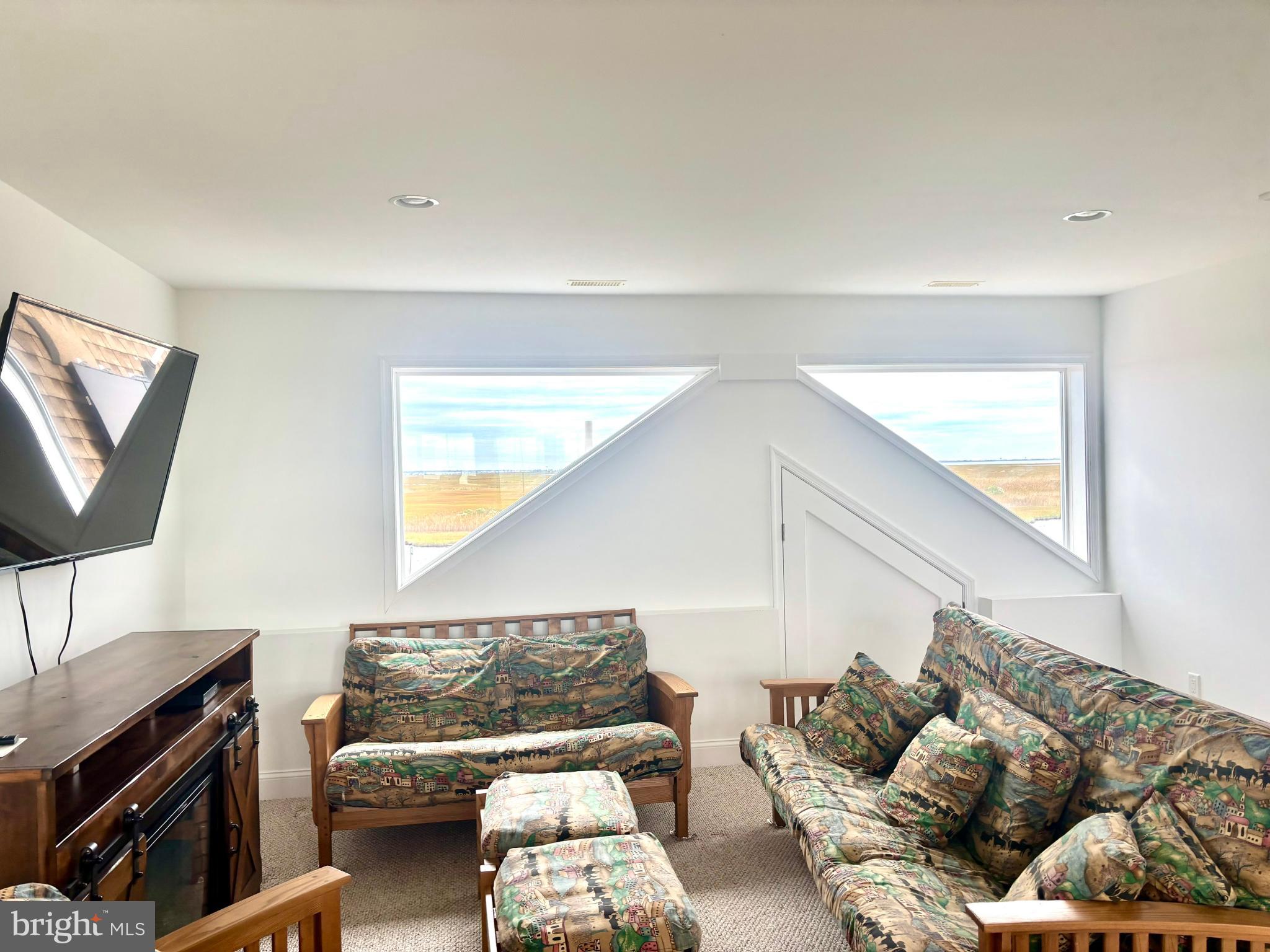 448 Dock Road West Creek, NJ 08092 - Photo 28 of 36 a living room with furniture and a flat screen tv