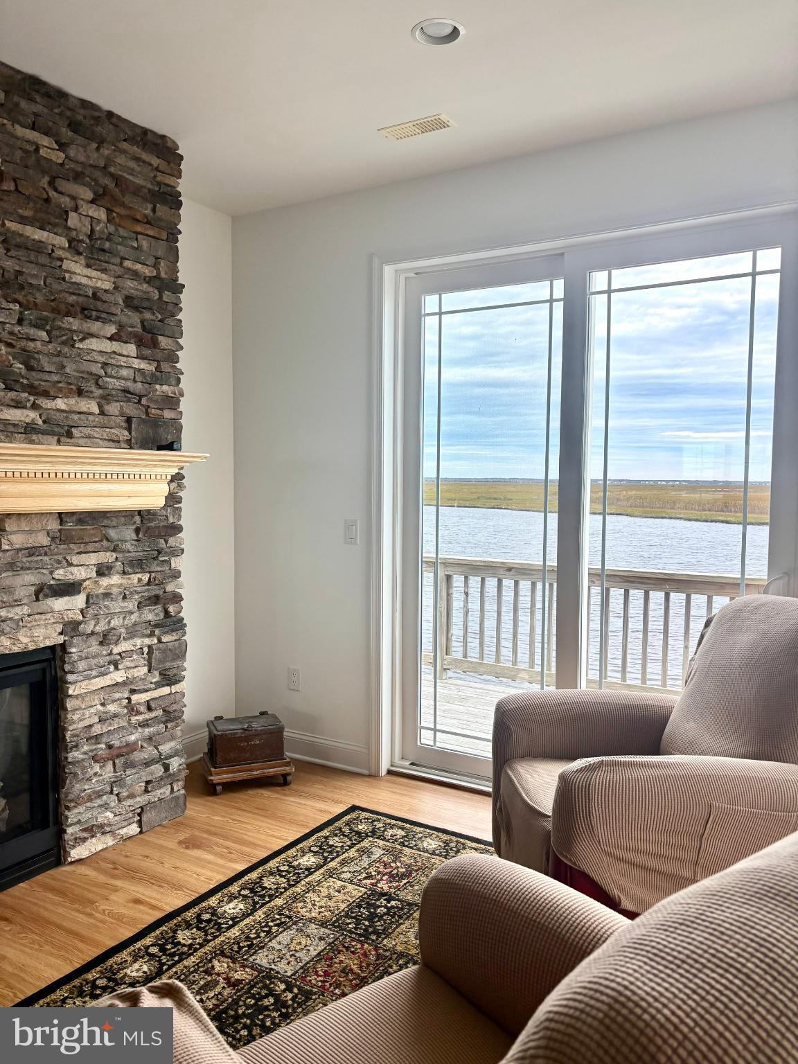 448 Dock Road West Creek, NJ 08092 - Photo 5 of 36 a living room with furniture and a fireplace