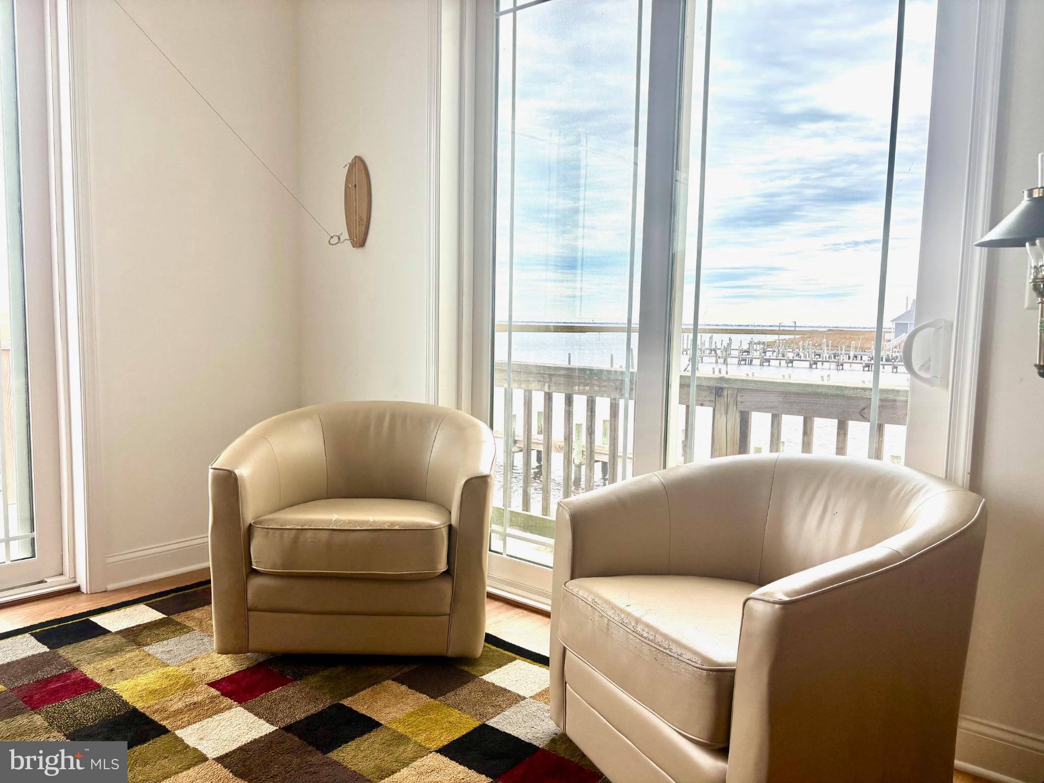 448 Dock Road West Creek, NJ 08092 - Photo 6 of 36 a living room with a couch and next to a window