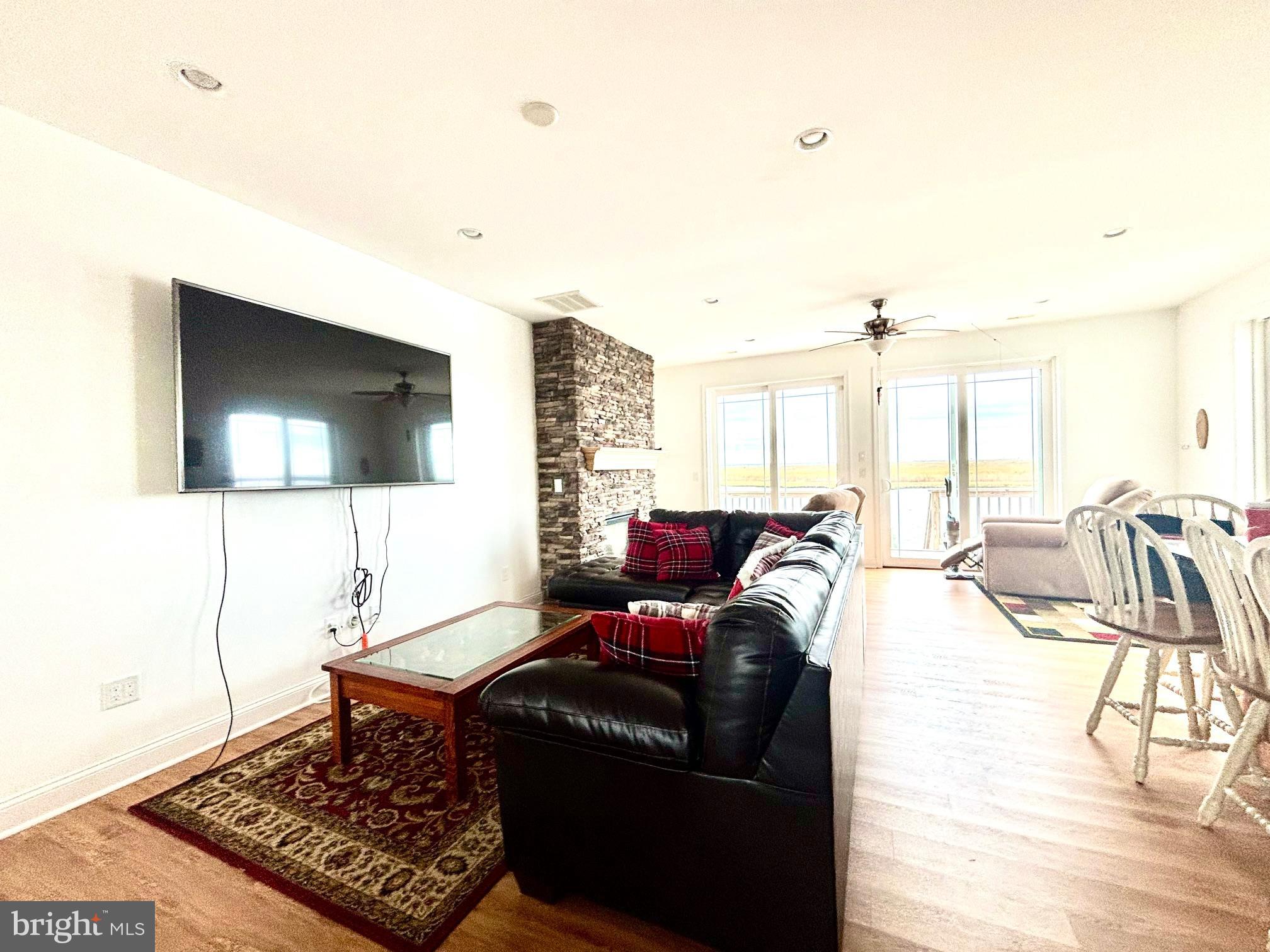 448 Dock Road West Creek, NJ 08092 - Photo 7 of 36 a living room with furniture and a flat screen tv