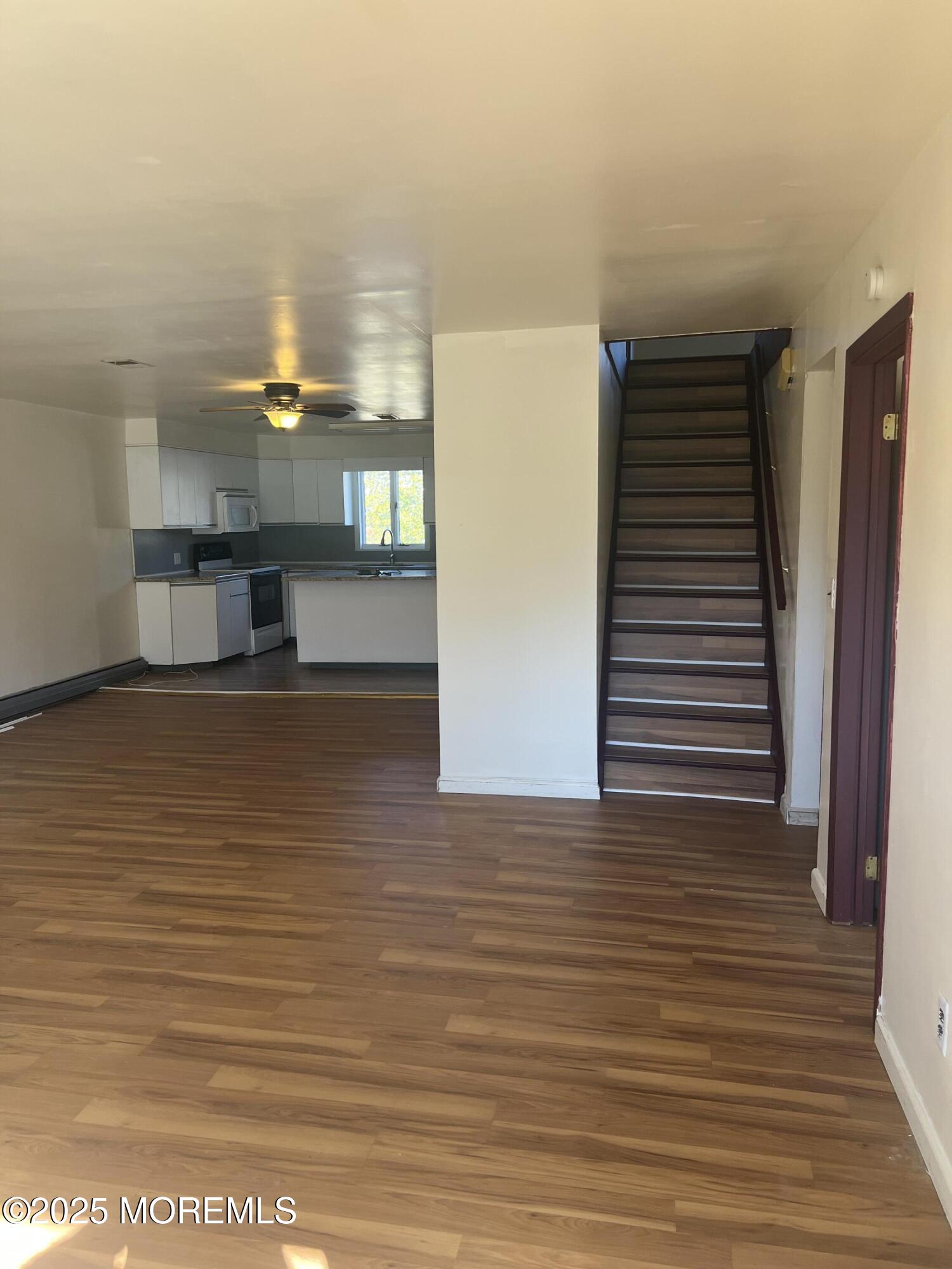 84 Bethany Road Hazlet, NJ 07730 - Photo 4 of 21 a view of a kitchen from the hallway