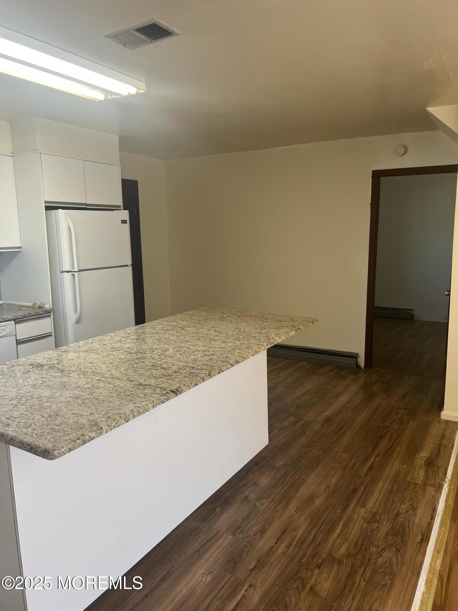 84 Bethany Road Hazlet, NJ 07730 - Photo 7 of 21 a view of kitchen and empty room