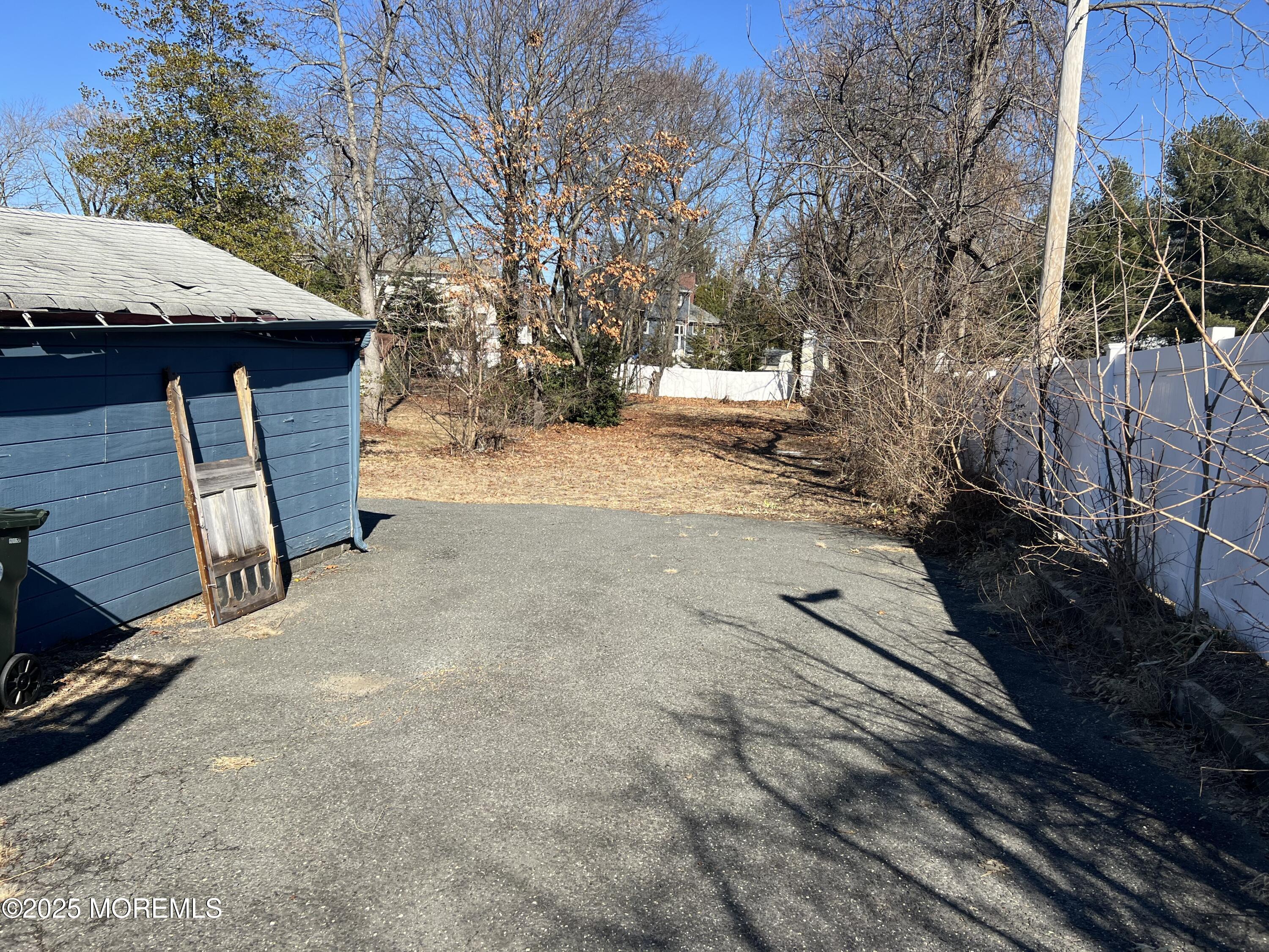 84 Bethany Road Hazlet, NJ 07730 - Photo 9 of 21 a view of a house with a yard