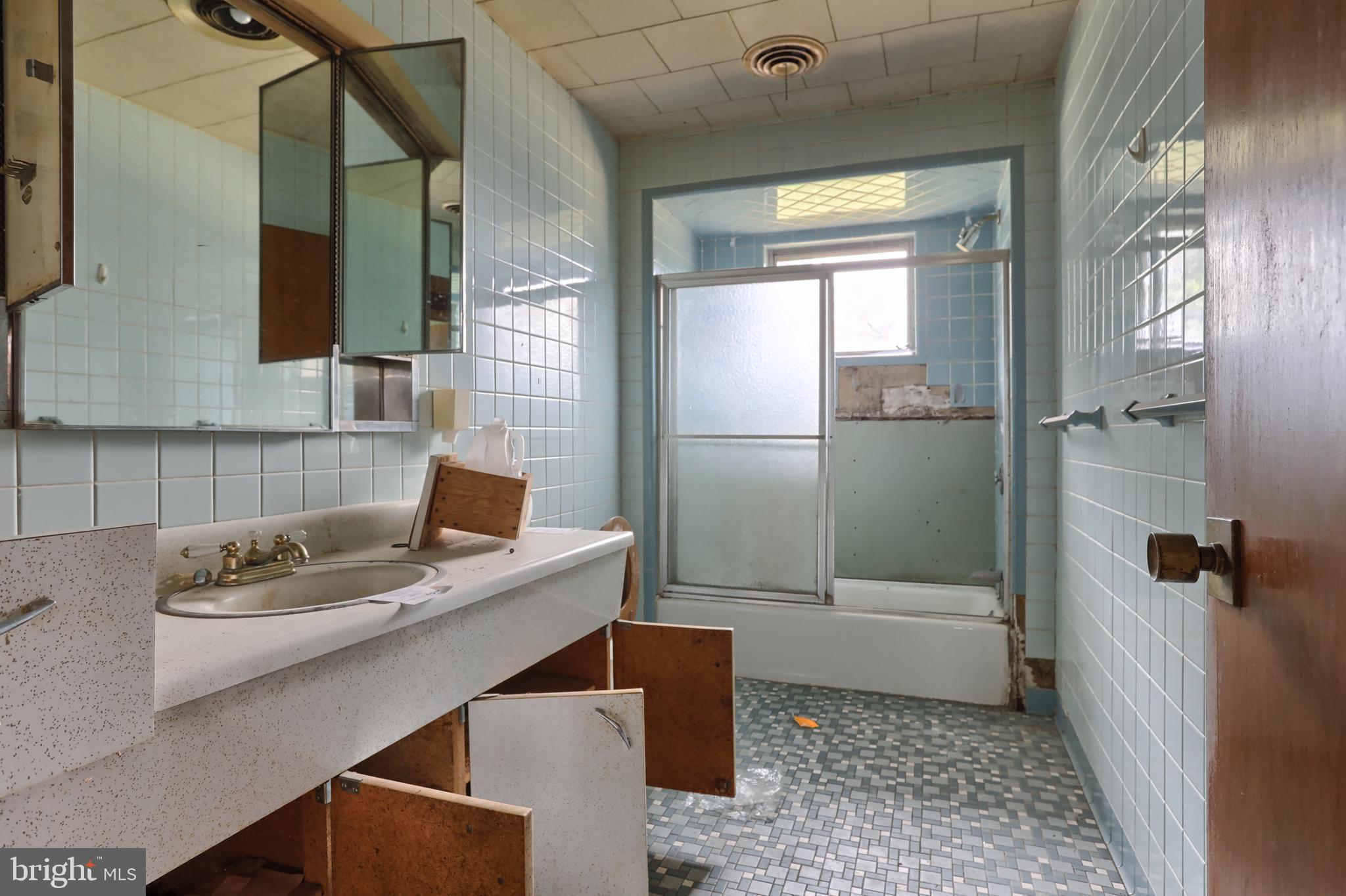 77 Tiley Road Ashland, PA 17921 - Photo 11 of 35 a bathroom with a sink a toilet and shower