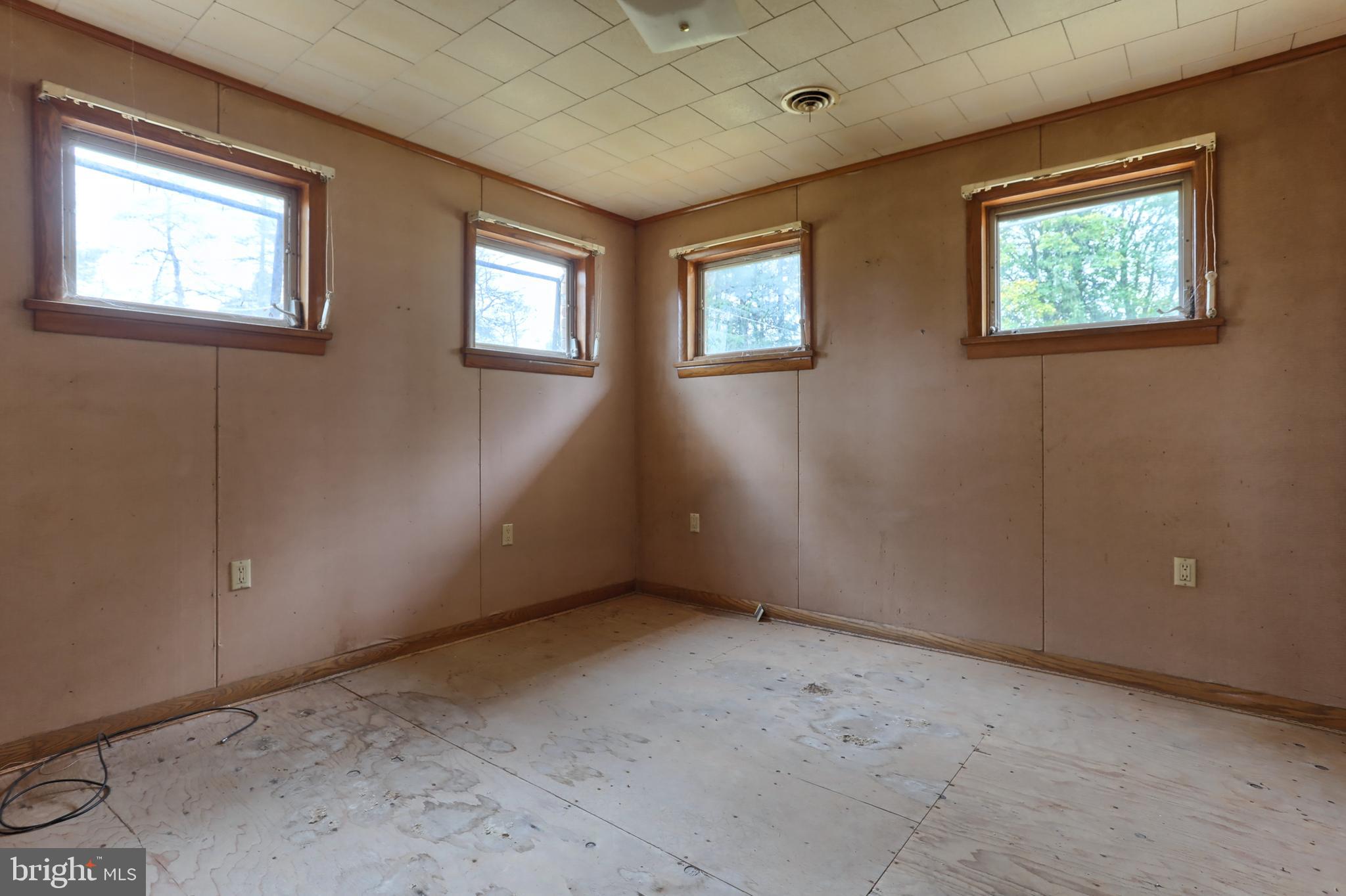 77 Tiley Road Ashland, PA 17921 - Photo 13 of 35 a view of an empty room with windows