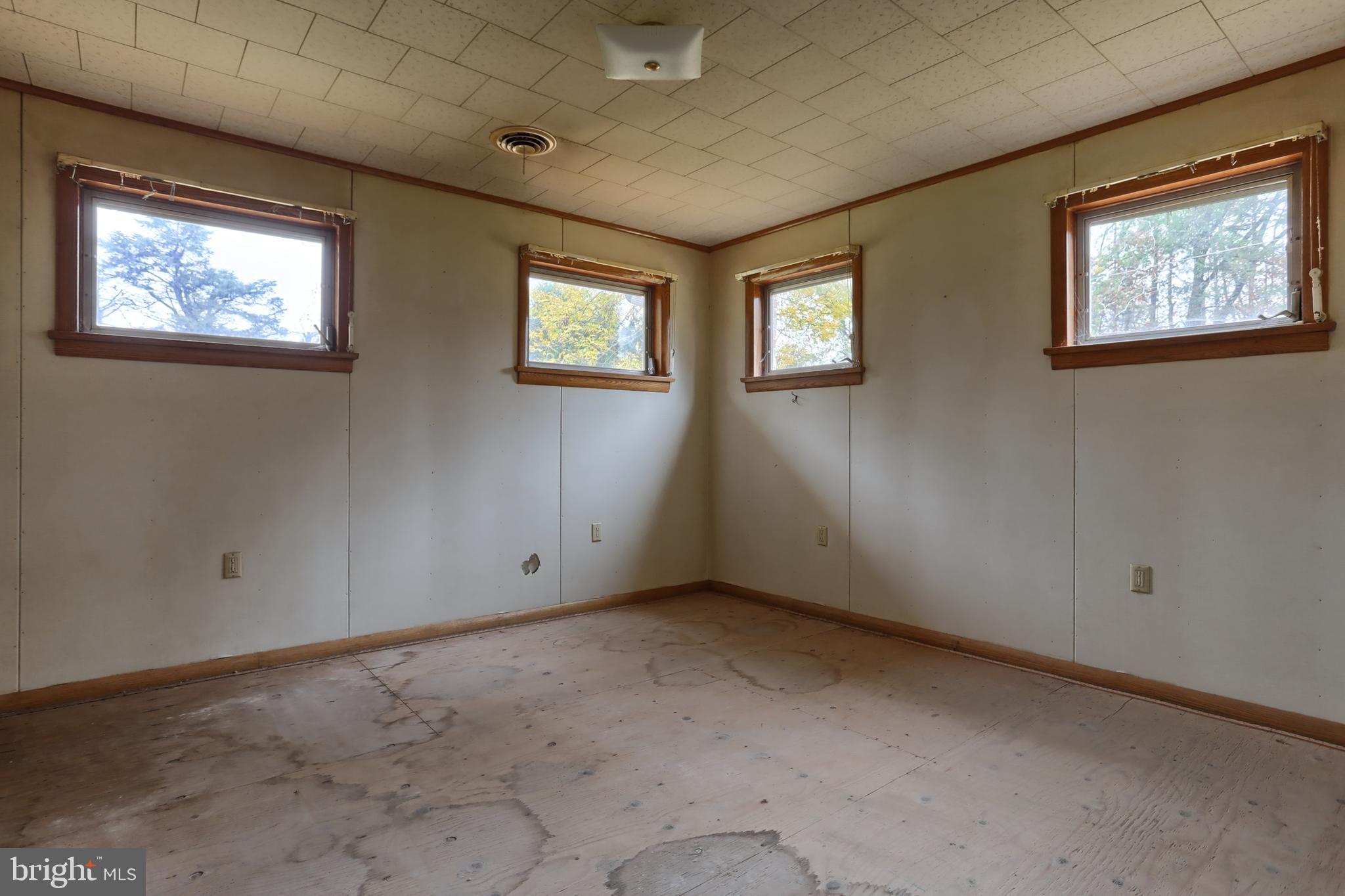 77 Tiley Road Ashland, PA 17921 - Photo 14 of 35 a view of an empty room with windows