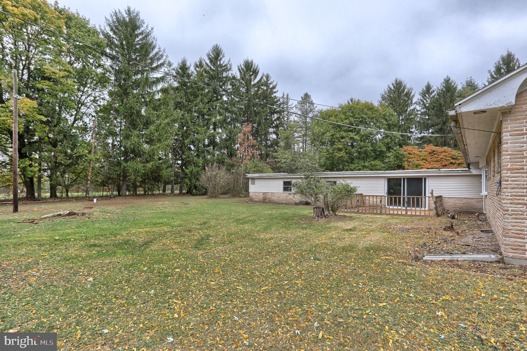 77 Tiley Road Ashland, PA 17921 - Photo 21 of 35 a house with trees in front of it