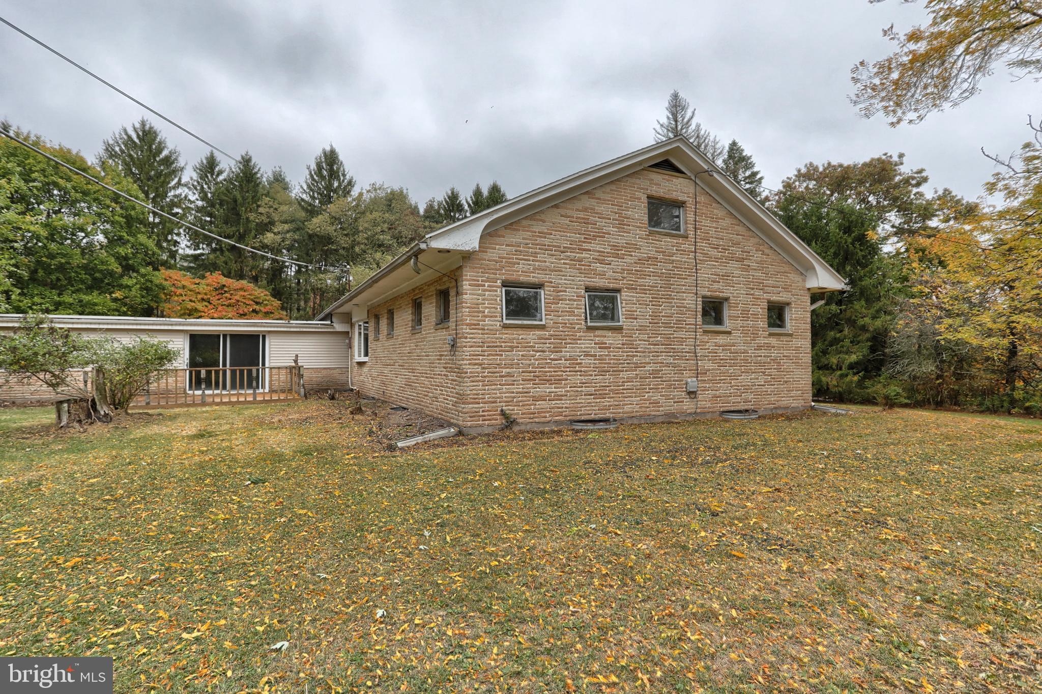 77 Tiley Road Ashland, PA 17921 - Photo 22 of 35 a view of a house with a yard