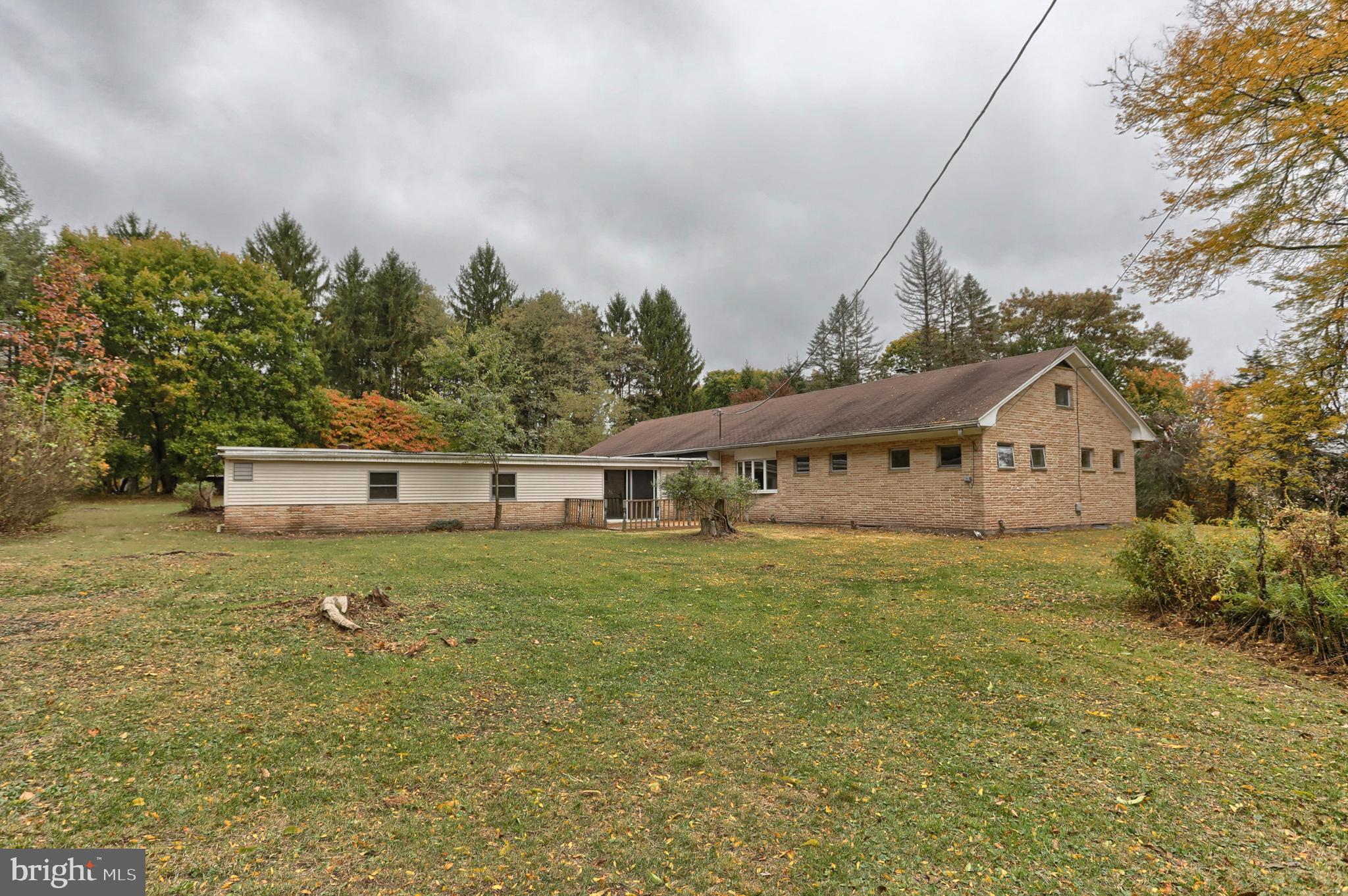 77 Tiley Road Ashland, PA 17921 - Photo 25 of 35 a house view with a garden space
