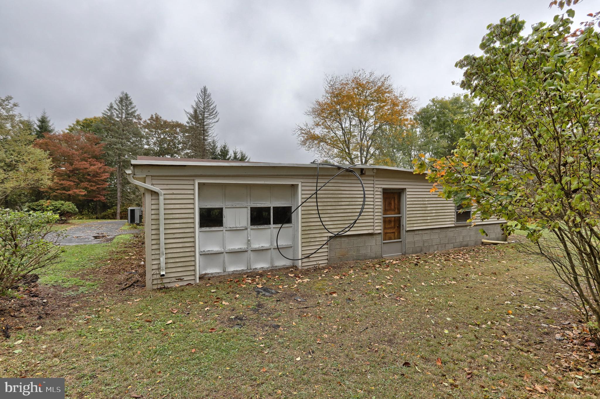 77 Tiley Road Ashland, PA 17921 - Photo 29 of 35 front view of a house with a yard