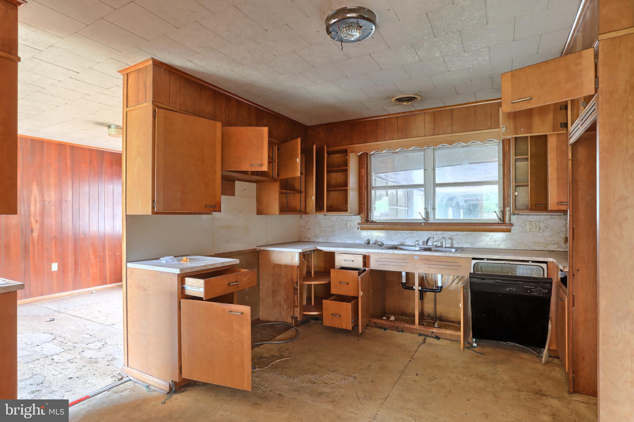 77 Tiley Road Ashland, PA 17921 - Photo 7 of 35 a kitchen that has a sink and a stove in it