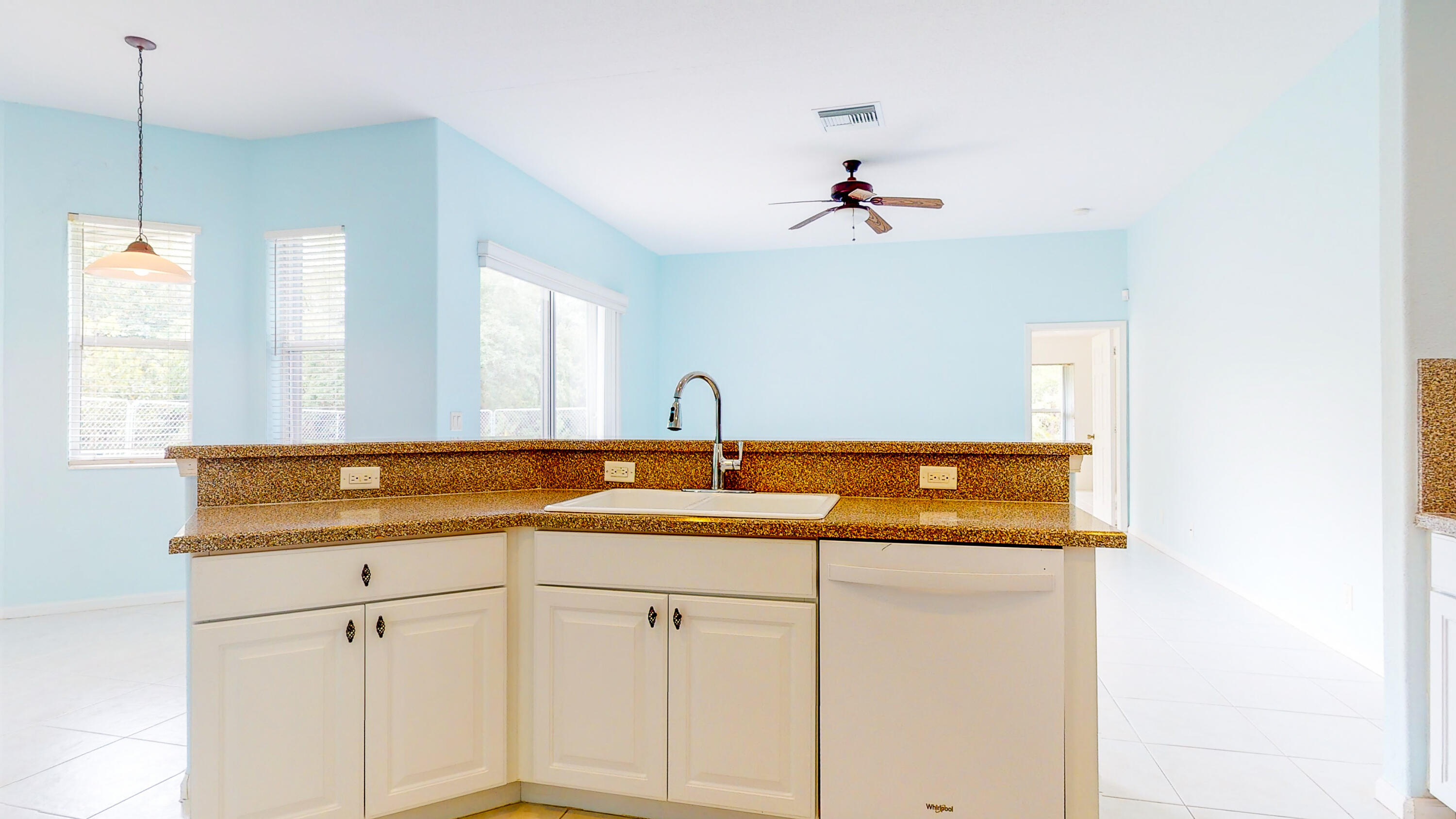 2072 Southeast Hanford Road Port St. Lucie, FL 34952 - Photo 13 of 48 a bathroom with a sink and vanity