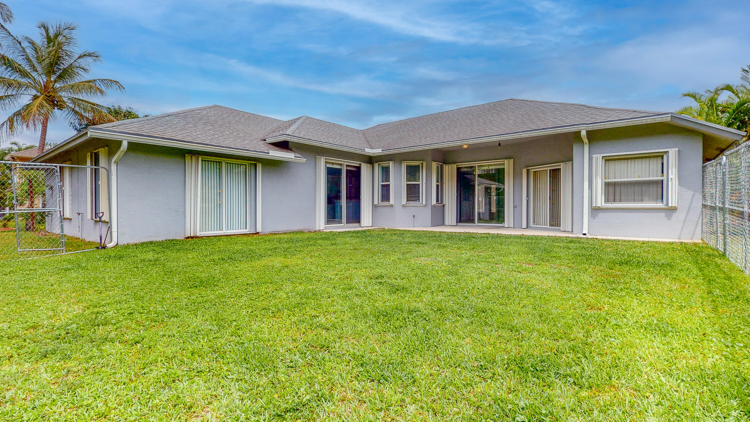2072 Southeast Hanford Road Port St. Lucie, FL 34952 - Photo 34 of 48 a view of a house with a garden