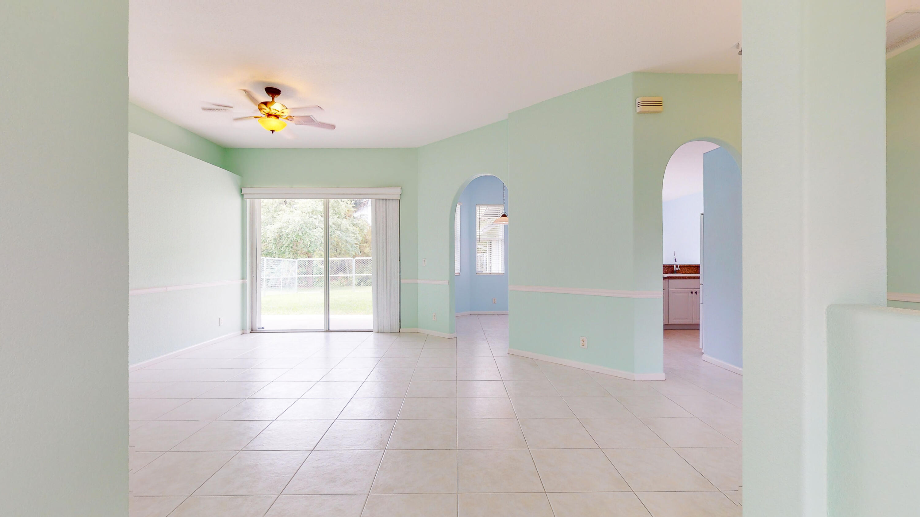 2072 Southeast Hanford Road Port St. Lucie, FL 34952 - Photo 7 of 48 a view of an empty room with a window